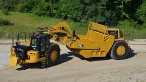 OPERATION AND MAINTENANCE MANUAL - CATERPILLAR 657 WHEEL TRACTOR 31G .