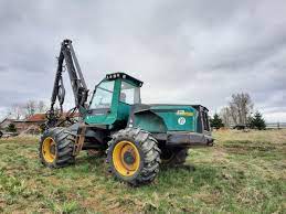 OPERATOR MANUAL - JOHN DEERE TIMBERJACK 870 Wheeled Harvester (F027722) Operator INSTRUCTION MANUAL SN 870001